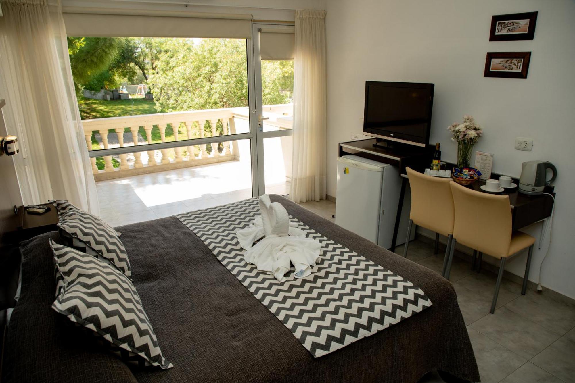 Villa La Font Apart Hotel & Spa Вилья-Карлос-Пас Экстерьер фото